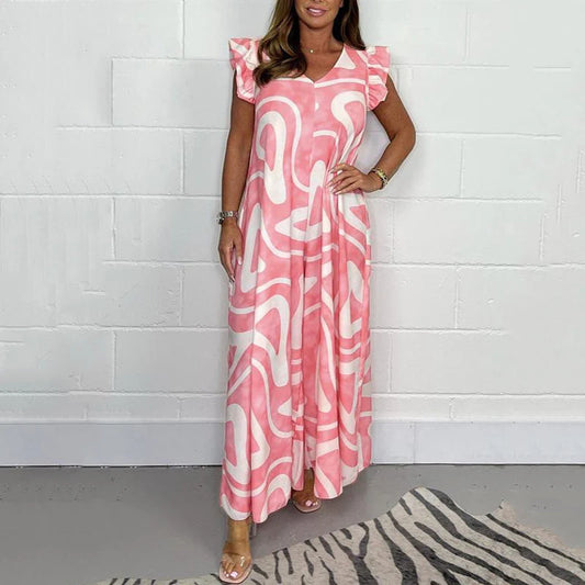 Dámský letní overal s širokými nohavicemi, volánky a geometrickým potiskem