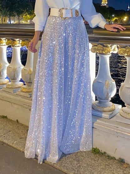 Elegantní halenka s dlouhým rukávem a výstřihem do V a flitrované overalové kalhoty se širokými nohavicemi