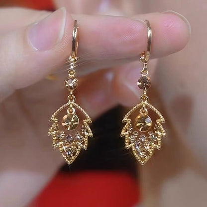 ✨Elegantní zlaté náušnice s třpytivými diamanty